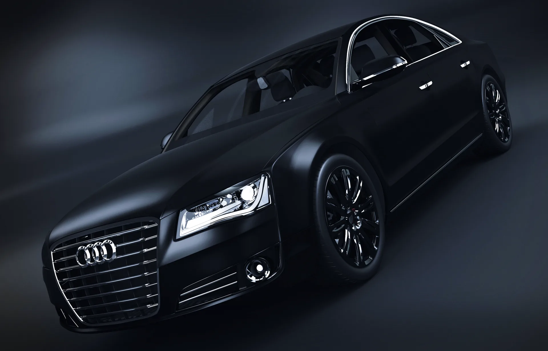 Mattschwarzer Audi A8 im dunklen Studiolicht